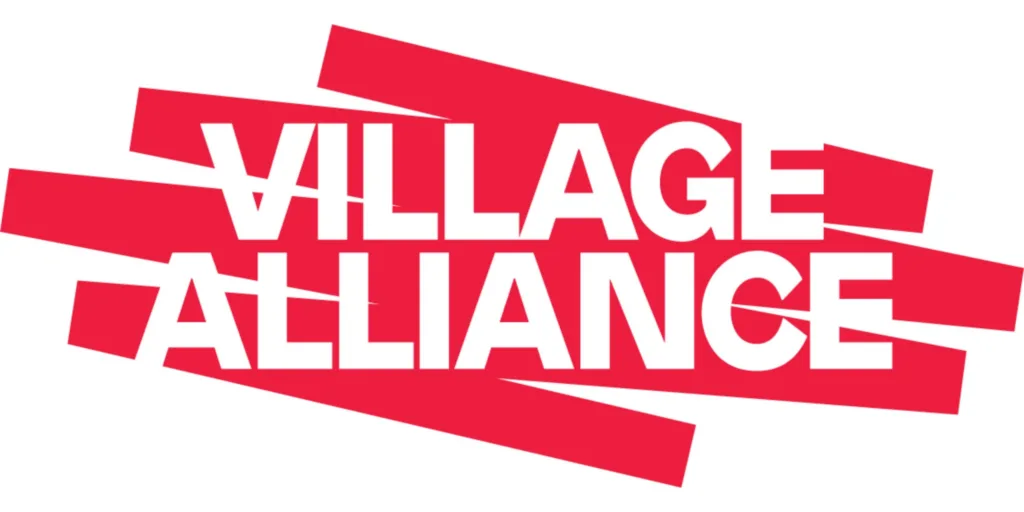 The image prominently displays the words Village Alliance in bold white letters, set against a backdrop of red overlapping rectangles, symbolizing the vibrant support of literary festival sponsors.